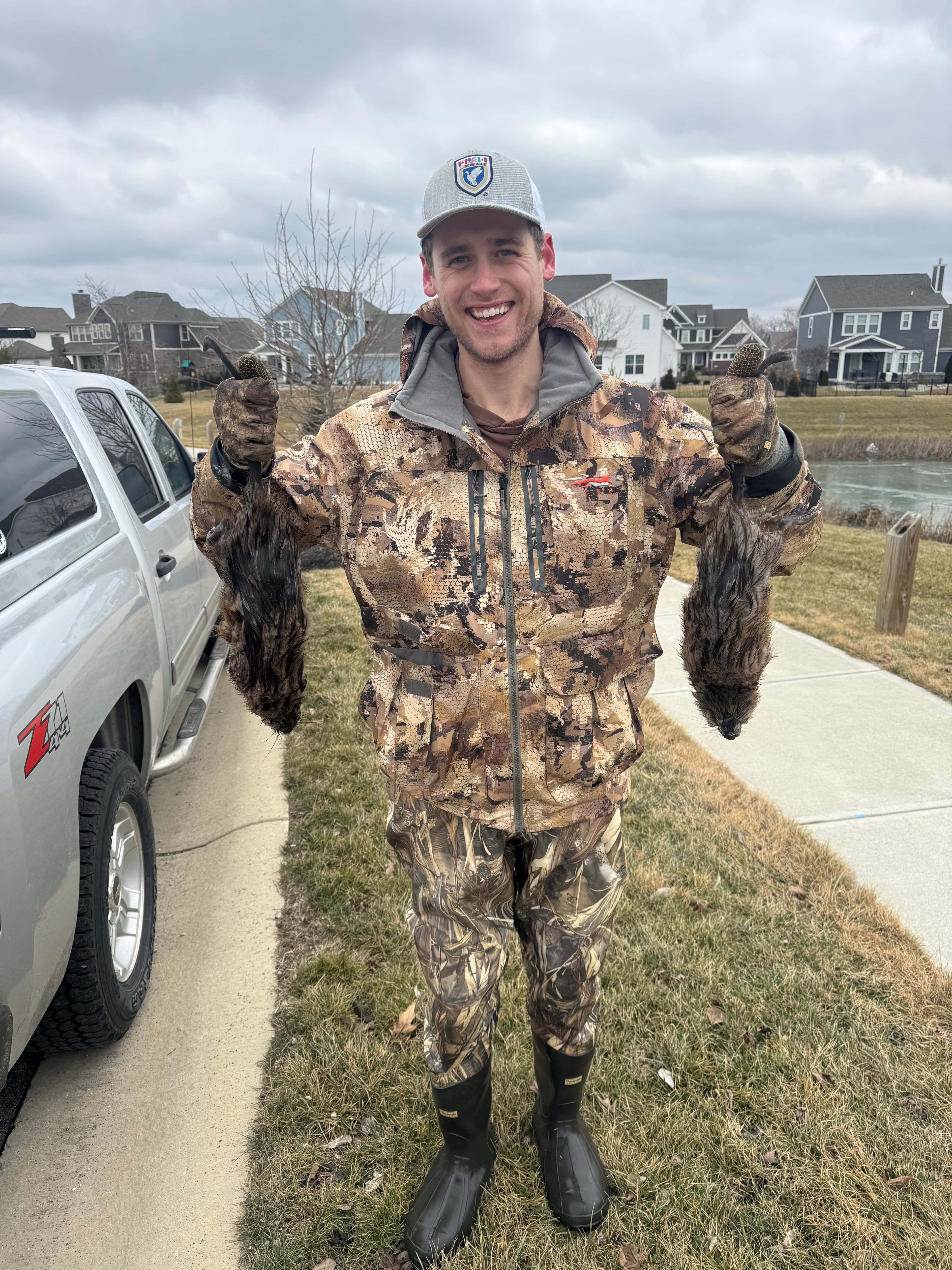 Connor Jackson with a muskrat